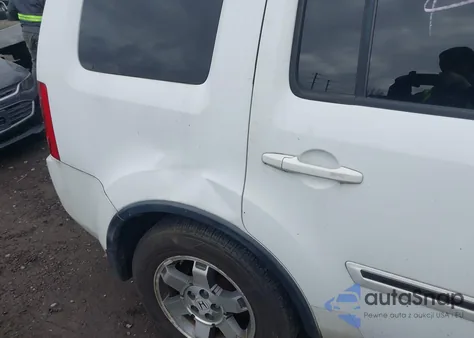 2010 Honda Pilot Touring z USA, uszkodzony, nr VIN 5FNYF4H80AB001882